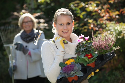 Professional gardener resolving a service complaint